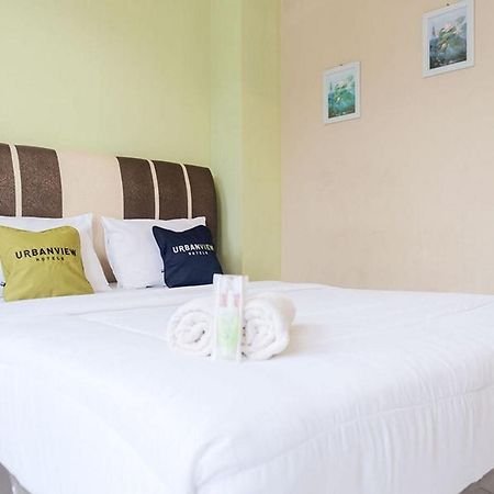 Urbanview Hotel Ta Ke Jelutung Puncak Jambi Buitenkant foto
