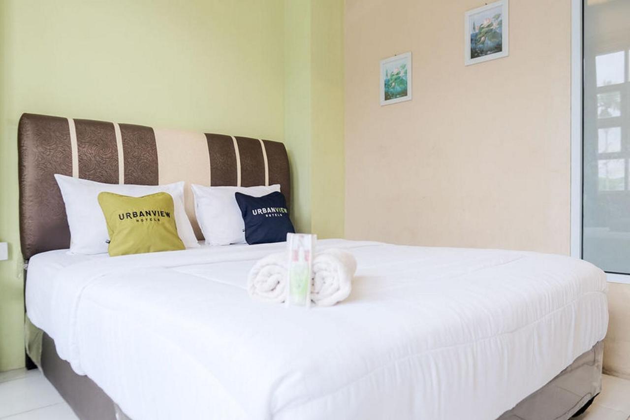 Urbanview Hotel Ta Ke Jelutung Puncak Jambi Buitenkant foto