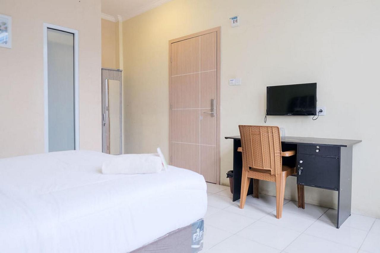 Urbanview Hotel Ta Ke Jelutung Puncak Jambi Buitenkant foto