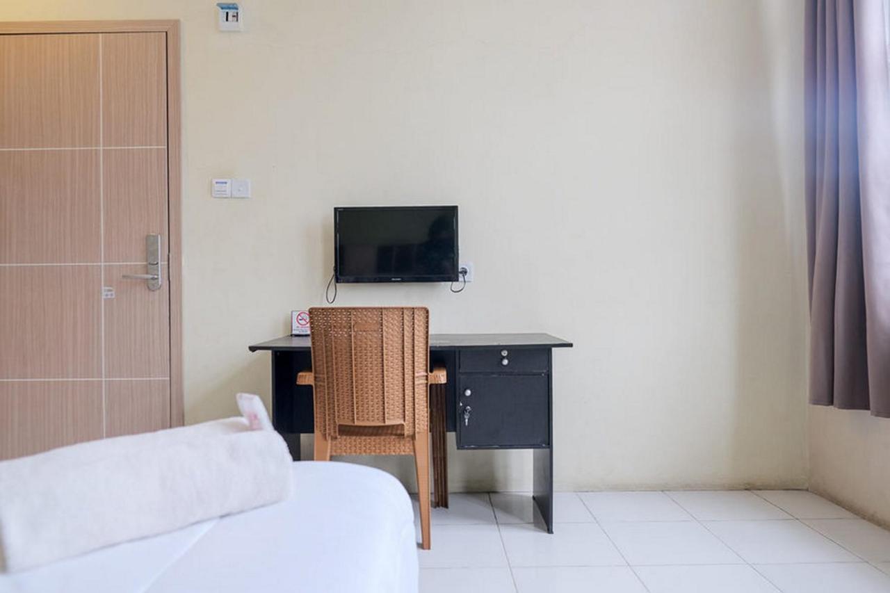 Urbanview Hotel Ta Ke Jelutung Puncak Jambi Buitenkant foto