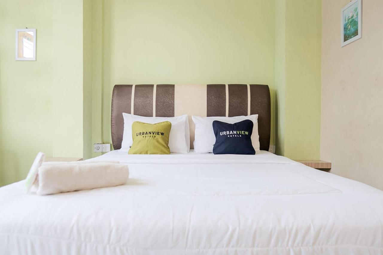Urbanview Hotel Ta Ke Jelutung Puncak Jambi Buitenkant foto