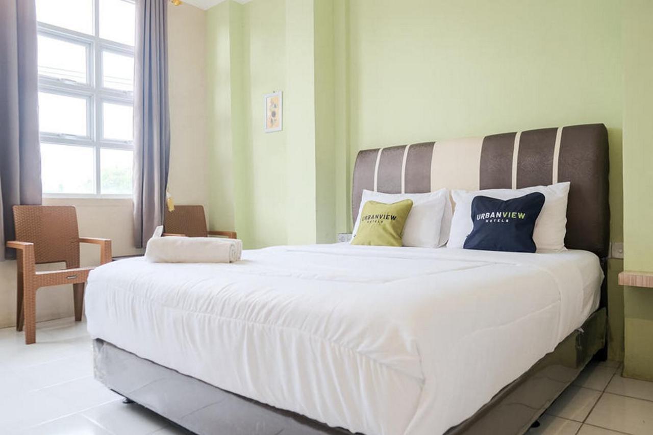 Urbanview Hotel Ta Ke Jelutung Puncak Jambi Buitenkant foto