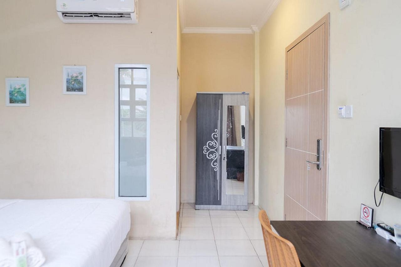 Urbanview Hotel Ta Ke Jelutung Puncak Jambi Buitenkant foto