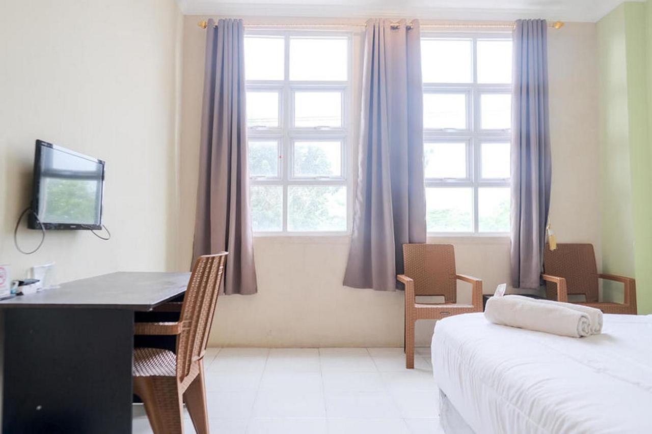 Urbanview Hotel Ta Ke Jelutung Puncak Jambi Buitenkant foto