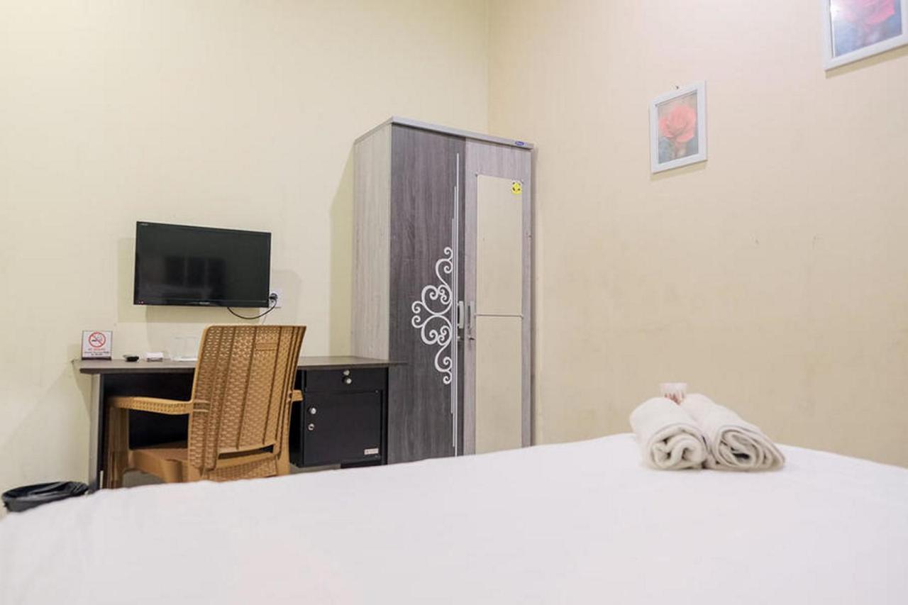 Urbanview Hotel Ta Ke Jelutung Puncak Jambi Buitenkant foto