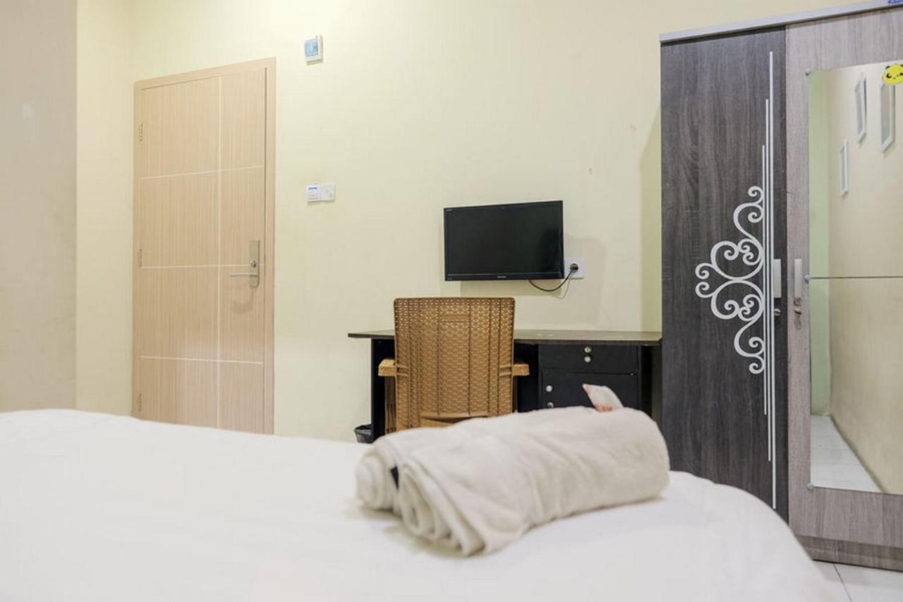 Urbanview Hotel Ta Ke Jelutung Puncak Jambi Buitenkant foto