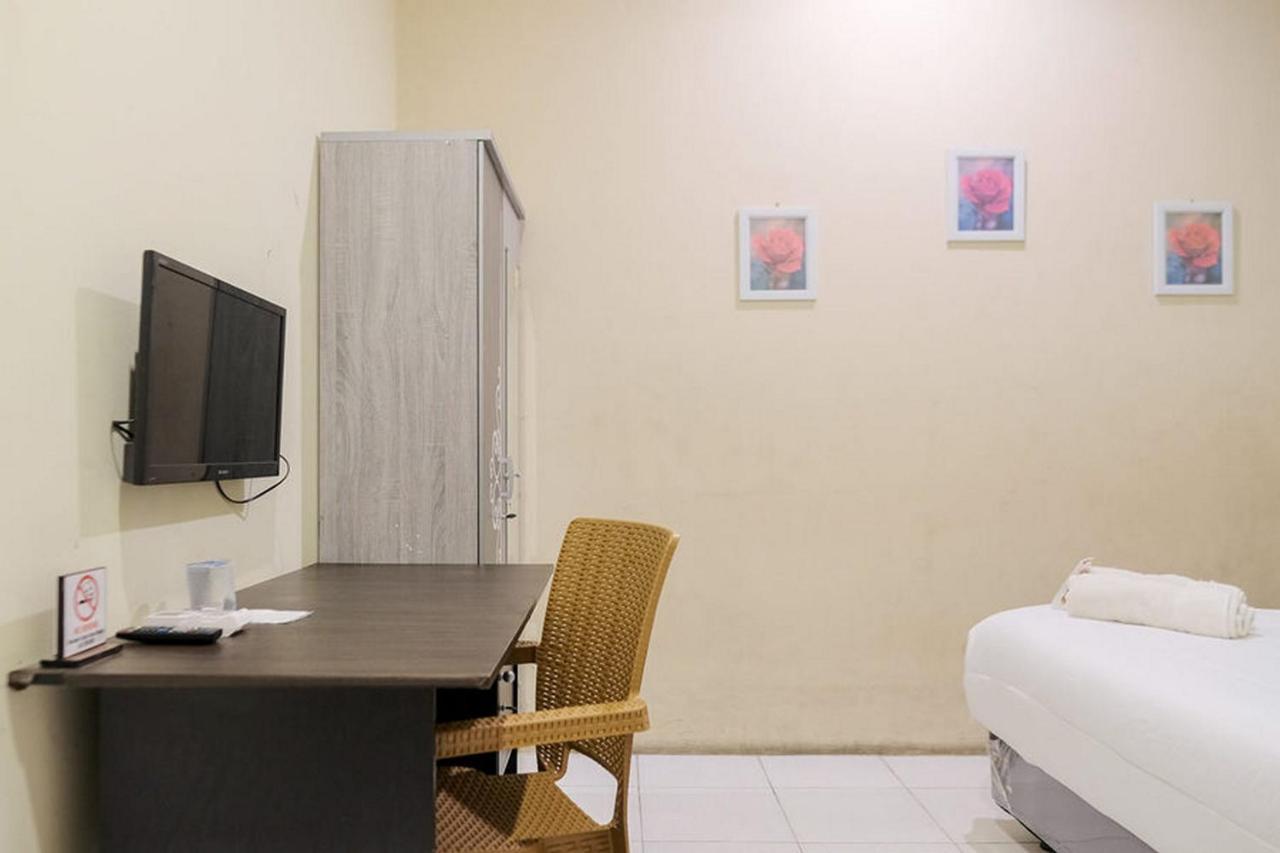Urbanview Hotel Ta Ke Jelutung Puncak Jambi Buitenkant foto